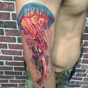 Jellyfish by Sean McCready. (IG - seanmccready) #SESSIONS #SeanMcCready #Hawaii #realistictattoo #jellyfish #colorful #sleeve