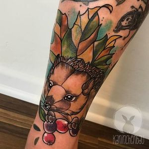 Hedgehog enjoying some fruit. Tattoo by Rebecca Bertelwick. #fruit #hedgehog #neotraditional #RebeccaBertelwick #animal