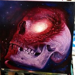A painting of a skull with a galaxy in its cranium by Christian Perez (IG—christian1perez). #ChristianPerez #fineart #galaxy #oilpaintings #skulls