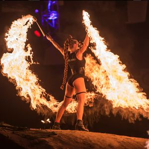 The Fuel Girl's Naomi performing a daring pyrotechnic stunt. #acrobatics #burlesque #LondonTattooConvention #FuelGirls #pyrotechnics