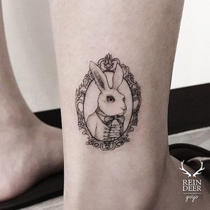 Rabbit tattoo by Goyo. #Goyo #subtle #fineline #southkorean #reindeerink #blackandgrey #floral #rabbit #bunny #portrait