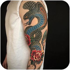 Powerful Cobra & Roses by Graham Beech. (Instagram: @grahambeech) #traditional #cobra #rose #InvisibleNYC #GrahamBeech