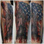 Statue of Liberty and American flag tattoo by Hayley Stabile. #styledrealism #neotraditional #statueofliberty #flag #americanflag #newyork #NY #statue #HayleyStabile