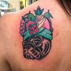 French bulldog wearing some fruit on its head. Awesome work by Luca Sala. #LucaSala #OldInkTattoo #boldtattoos #solidtattoos #frenchbulldog #frenchie #fruits
