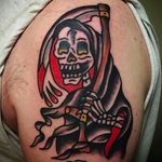 Rad looking reaper tattoo done by Aldo Rodriguez. #AldoRodriguez #GrandUnionTattoo #traditionaltattoo #boldtattoos #reaper #grimreaper