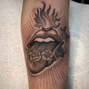 Traditional piece by Ben Grillo #BenGrillo #traditional #blackandgrey #sacredheart #rose #flame #mouth #sword #tattoooftheday
