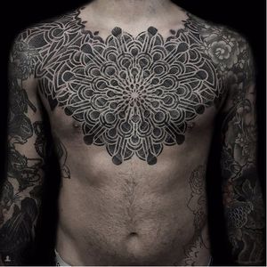 Jaw-dropping chest tattoo by Eric Stricker #EricStricker #monochrome #dotwork #blackwork #geometric #ornamental