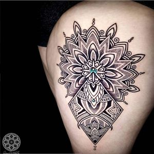 An amazing blackwork mandala with a light blue jewel at its heart by Coen Mitchell (IG—coenmitchell). #blackwork #dotwork #CoenMitchell #geometric #jewels #mosaicflows #ornamental
