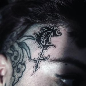Blackwork face tattoo by OilBurner. #OilBurner #blackwork #metal #dark #gothic #handstyle