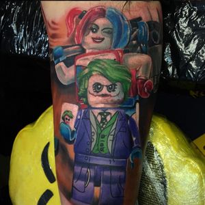 Max Pniewski's (maxpniewski) tattoo of Lego Joker and Harley Quinn. #comicbooks #HarleyQuinn #Joker #Legos #MaxPniewski #superheroes