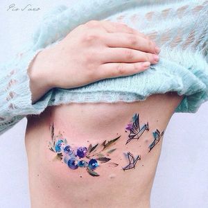 Poetic tattoo by Pis Saro #PisSaro #vegetal #watercolor #origami #bird #berries #berry #leaves #poetic