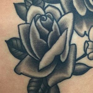 Beautiful and clean black rose tattoo by Nate Graves. #NateGraves #Sacred #michigan #neotraditional #rose #blackwork #blackrose