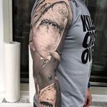 Black and grey shark sleeve looking scary as fuck, by Cigla. (via IG—ciglatattoo) #TattooRoundUp #Sleeves #Realism #blackandgrey #Sharks #Ocean