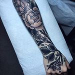Blackwork botanical tattoo by Savannah Colleen McKinney. #blackwork #linework #dotwork #SavannahColleenMcKinney #botanical #flowers