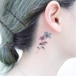 Floral behind-the-ear tattoo by Banul. #Banul #TattooistBanul #flower #floral #microtattoo #fineline #subtle #micro #tiny #feminine #girly #behindtheear #trend #southkorean