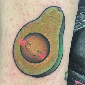 Cute, smiling avocado tattoo by Hollie West. #fruit #avocado #cute #traditional #HollieWest