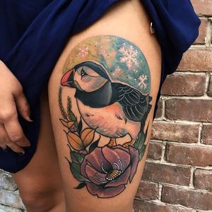 Floral Winter-themed puffin tattoo by John Mendoza. #neotraditional #flowers #bird #puffin #winter #snowflake #JohnMendoza