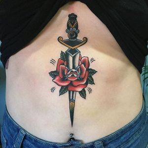 Dagger and rose sternum tattoo by Emily Jane. #traditional #dagger #flower #rose #EmilyJane