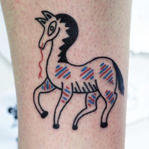 Playful lil git. Tattoo by Woozy Machine #WoozyMachine #horsetattoos #color #illustrative #folktraditional #abstract #linework #horse #cute #drawing