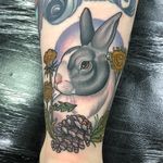 Bunny tattoo by Sadee Glover #SadeeGlover #bunnytattoos #color #neotraditional #bunny #rabbit #nature #animal #pinecone #dandelion #floral #leaves
