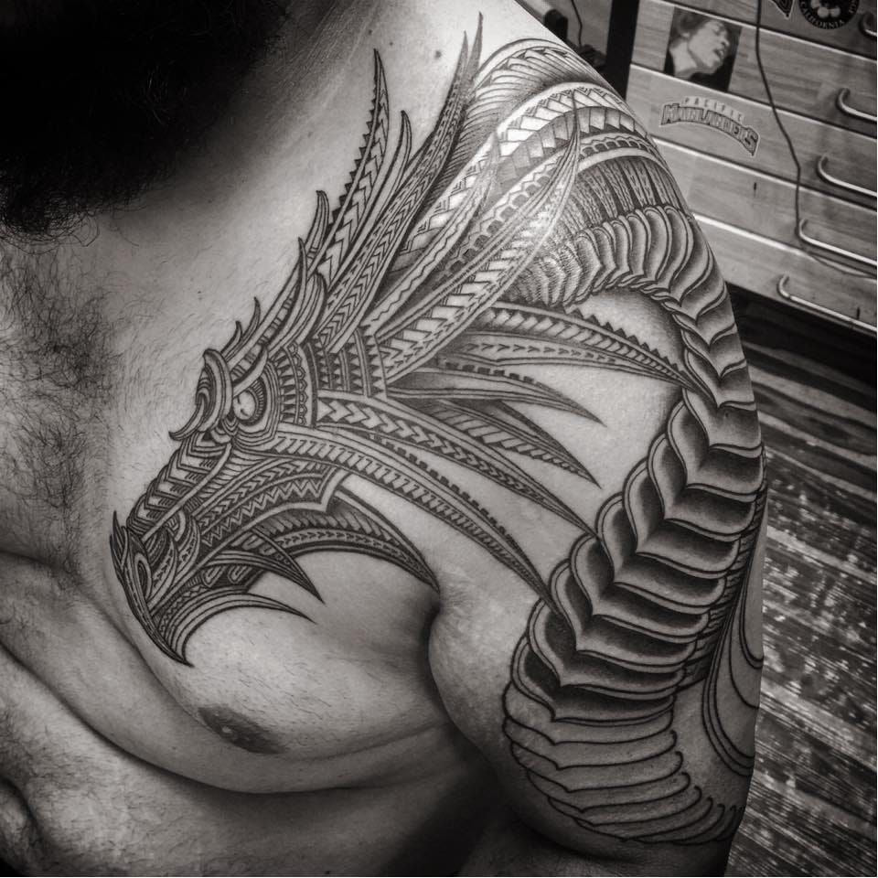 tribal dragon tattoo chest