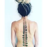 Spine line tattoo by Pis Saro. #PisSaro #floral #placement #flower #ladies #women #ideas #gorgeous #spineline #spine