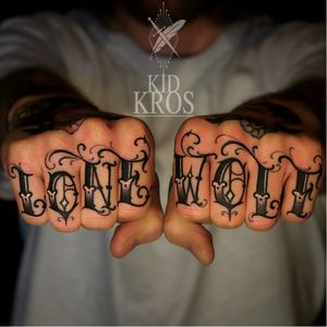 Lone Wolf Knuckle Tattoos by Kid Kros #KidKros #Knuckles #KnuckleTattoos #HandTattoos #Traditional #Black #Lettering #Script