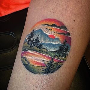 Watercolor landscape tattoo by Kevin Ray #KevinRay #landscapetattoo #watercolor #color #painterly #painting #mountains #clouds #sun #sky #forest #lake #nature #birds #grass #vacation #tattoooftheday