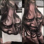 Insane Hannya mask tattoo on a hand. Marvelous work by Tye Harris. #tyeharris #blackandgray #hannya