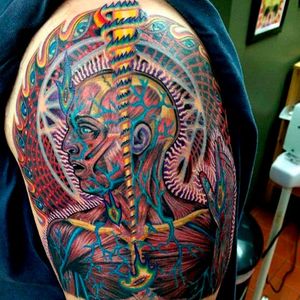 Tattoo inspired by the Lateralus album illustrated by Alex Grey. Photo from Tumblr by unknown artist #Tool #AlexGrey #progressivemetal #albumcover #lateralus #bandtattoo