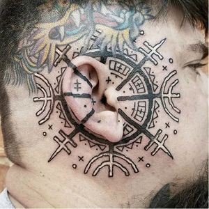 Large-scale ear tattoo by Watson Atkinson. #WatsonAtkinson #alchemy #symbols #arcane #whiteink  #ear #eartattoo
