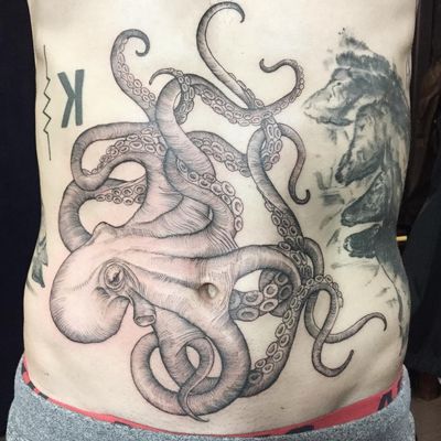 Octopus tattoo by Maggie Cho #MaggieCho #octopustattoos #blackandgrey #linework #illustrative #woodblockstyle #ocean #oceanlife #animal #nature #tentacles #tattoooftheday