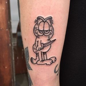 Garfield tattoo by Candi Kinyobi. #Garfield #comic #cartoon #cat