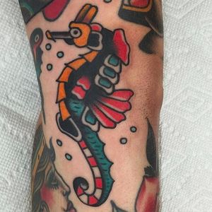 Solid and vibrant looking little sea horse tattoo done by Jason Ochoa. #JasonOchoa #GreenPointTattooCo #traditionaltattoo #boldtattoos #seahorse
