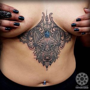 Sacred geometric underboob tattoo by Coen Mitchell. #CoenMitchell #sacredgeometric #sacredgeometry #underboob #wolf
