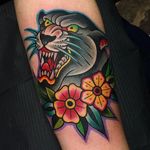 Samuele Briganti (IG—samuelebriganti) adorns this excited panther with floral work. #bigcats #bold #busts #colorful #fierce #flowers #panther #SamueleBriganti #traditional