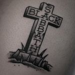 Black Sabbath tattoo by Sammy Harding #SammyHarding #blackandgreytattoo #traditionaltattoo #blacksabbathtattoo #musictattoos #rockandrolltattoo #crosstattoo #headstonetattoo #deathtattoo #fonttattoo #tattoooftheday