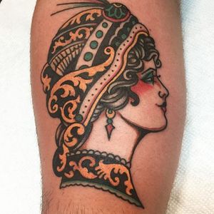 A beautiful and heavily adorned lady head by Mike Suarez (IG— suarezism). #ladyheads #MikeSuarez #ornate #pinups #traditional