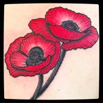 Red flower tattoo by @Capratattoo #Capratattoo #traditional #black #red #flowertattoo #flower #SkullfieldTattoo
