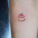 Dessert. Tattoo by Jess Chen #JessChen #besttattoos #watercolor #color #realism #realistic #cake #dessert #sweets #strawberry #cute