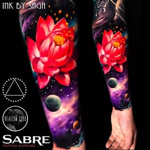 Intense colors on this Lotus and Galaxy Tattoo by Saga Anderson @inkbysaga #SagaAnderson #InkbySaga #Realistic #Galaxy #Cosmic #Universe #Stars #Planets #Lotus #Realismclub