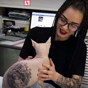 A tattooed cat. What is wrong with this world? #tattoo #pets #anger