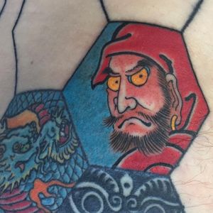 Daruma tattoo by Chris Garver #ChrisGarver #colortattoo #Japanesetattoo #Darumatattoo #portraittattoo #Buddhisttattoo #Bodhidharmatattoo #besttattooartists