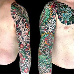One of our very own tattoo ambassadors, @HenningJorgensen, executes the traditional Japanese style in this sleeve. (Instagram @henning_royaltattoo). #cherryblossoms #dragon #HenningJorgensen #Japanese #peony #sleeve #traditional