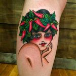 A girl with chili peppers on her head. Tattoo by Anem. #Anem #traditionaltattoo #girl #girltattoo #chilipepper #traditional #traditionalgirl