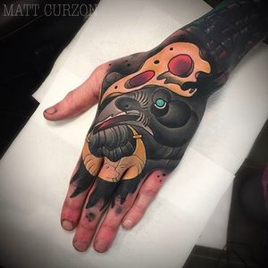 Awesome looking hand tattoo of a crow done by Matt Curzon. #mattcurzon #crow #neotraditional #crowtattoo #bird #hand #handtattoo