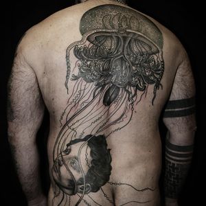 Jellyfish and floating head tattoo by Pietro Sedda #PietroSedda #backpiecetattoos #blackandgrey #surreal #darkart #illustrative #jellyfish #head #man #portrait #oceanlife