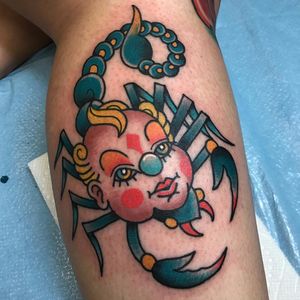 Baby clown scorpion weirdness by Billy White from Joe Breitenbach flash #BillyWhite #baby #scorpion #clown #creepy #color #newtraditional #traditional #tattoooftheday