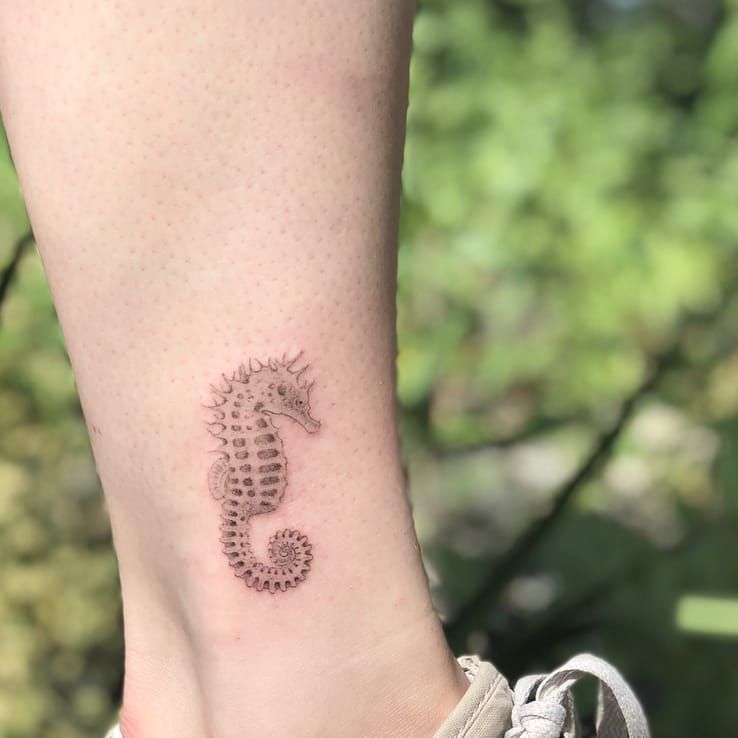 seahorse tattoo wrist