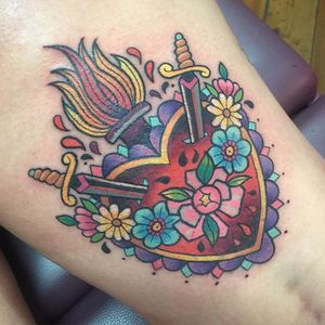 Traditional dagger tattoo by Sarah K. #SarahK #girly #traditional #dagger #flower #heart #heartdagger
